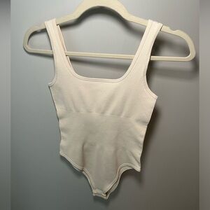 Cream Ribbed Tank Bodysuit Body contour